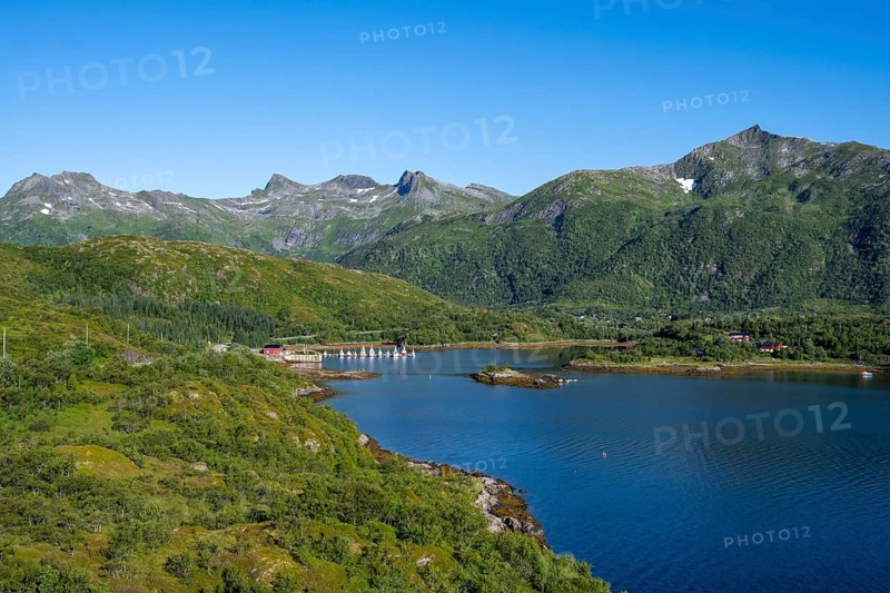 Small harbour on the Austnesfjorden fjord, idyllic Norwegian fjord landscape, Sildpollen, Nordland, Norway