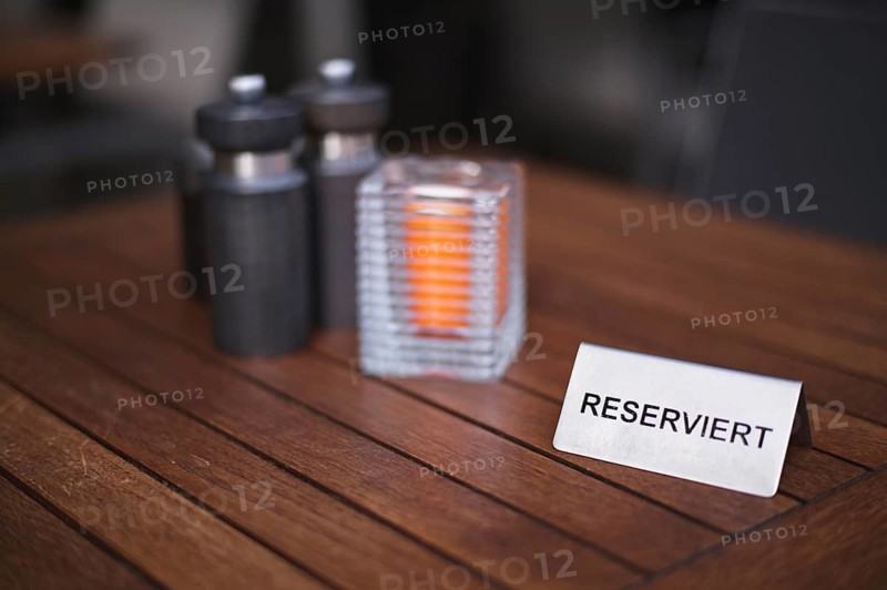 Exterior view, sign RESERVED, reservation for restaurant, eatery, table, candle, salt, pepper, Stuttgart, Baden-Württemberg, Germany