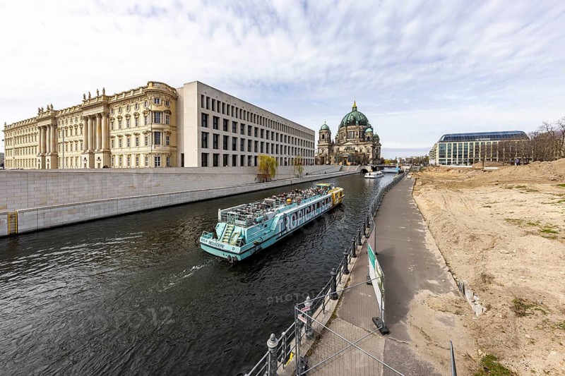 City Palace and Humboldt Forum. Redesign of the Town Hall and Marx-Engels Forum. Exterior view with Spree and sightseeing boat. View of Berlin Cathedral. Berlin, Germany