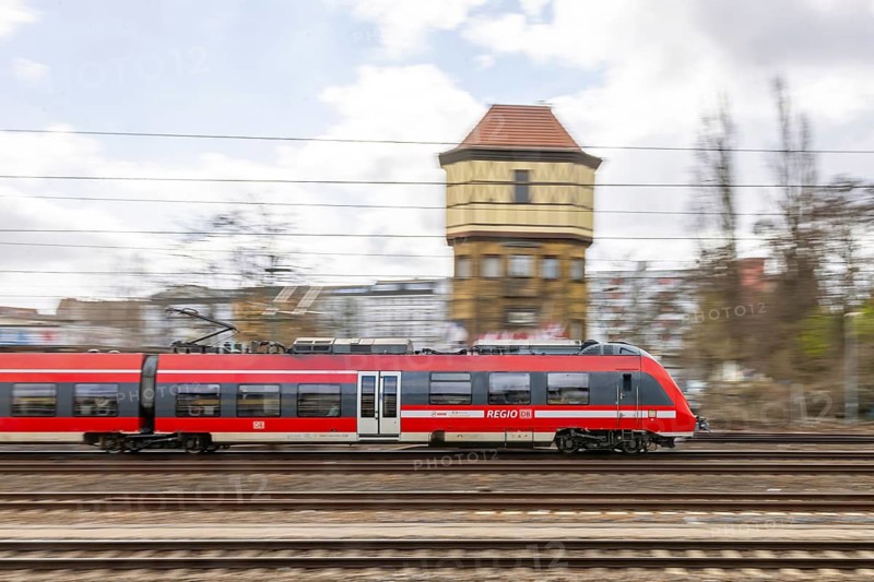 Beusselstraße station of the Berlin S-Bahn with regional train. motion blur. Berlin, Germany