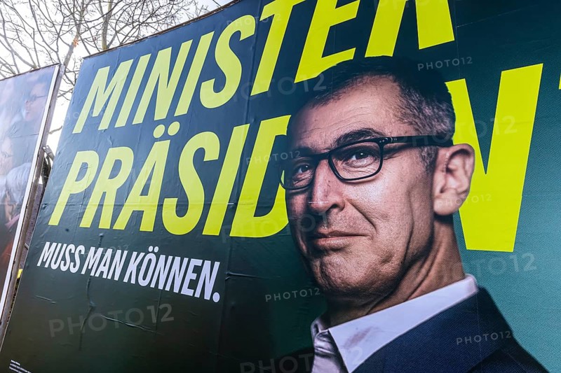 2026 state election in Baden-Württemberg. Election posters at a crossroads in Fellbach. Large posters of the top candidates from CDU and Die Grünen side by side. Fellbach, Baden-Württemberg, Germany