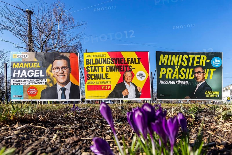 2026 state election in Baden-Württemberg. Election posters at a crossroads in Fellbach. Large posters from CDU, FDP and Die Grünen. Fellbach, Baden-Württemberg, Germany