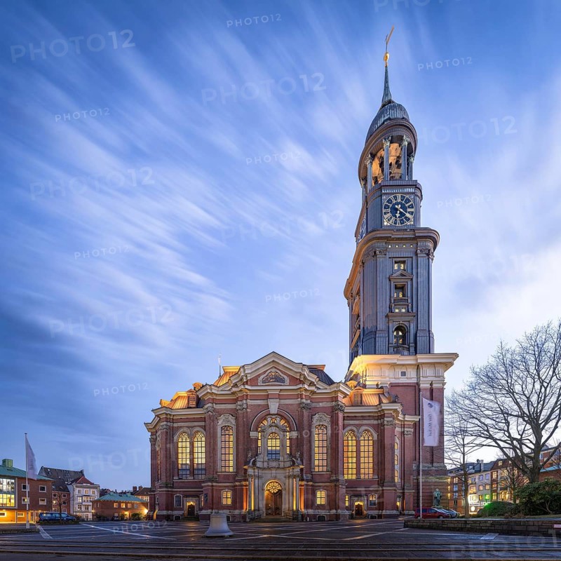 Main church St Michaelis (Michel) at blue hour with moving clouds in the background, Hamburg, Germany