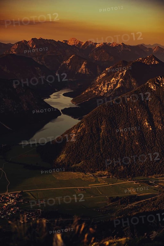 Thaneller summit at sunset in the Lechtal valley in Tyrol with a wonderful view of the surrounding mountains. Tyrol, Austria