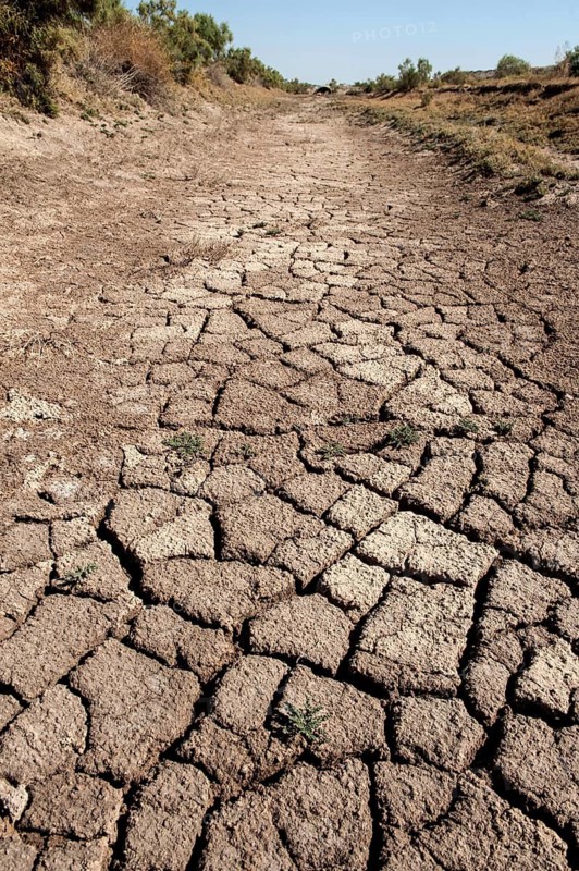 Basra, Iraq. October 31st 2018 Cracked earth of dry river bed at Charax archaeological site near Basra in Iraq