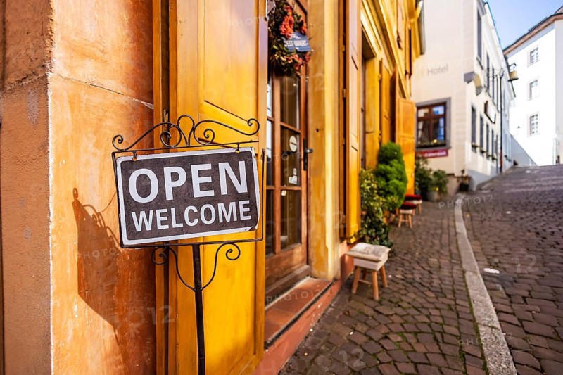 City view with narrow alley in the old town, sign with the inscription Welcome. Baden-Baden, Baden-Württemberg, Germany