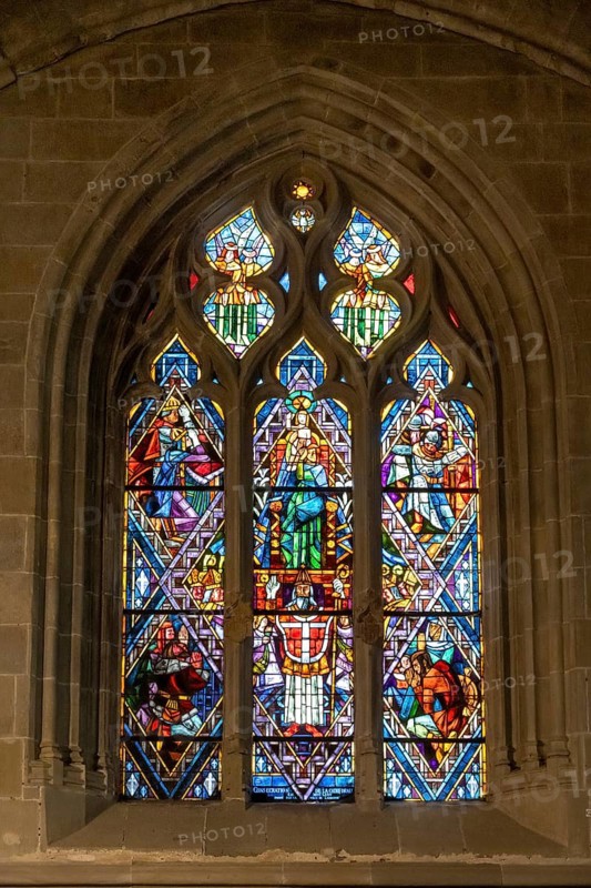 Colourful stained glass windows, Notre-Dame Cathedral, former episcopal church of the diocese of Lausanne, today the main reformed church of the city of Lausanne, canton of Vaud, Switzerland