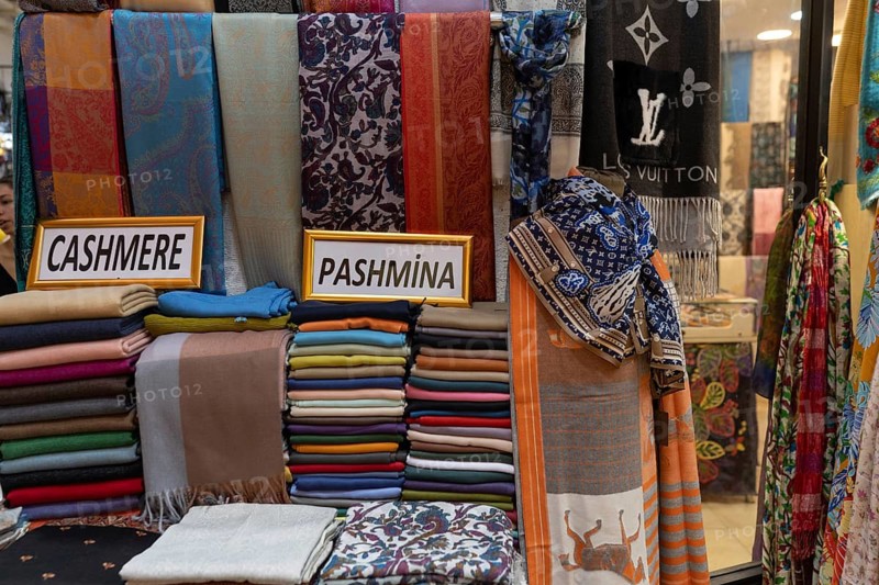 Istanbul, Turkey. June 23rd 2025. Pashmina, Cashmere and other fashion textiles for sale in the Grand Bazaar, one of the largest and oldest covered markets in the world, Istanbul, Turkey
