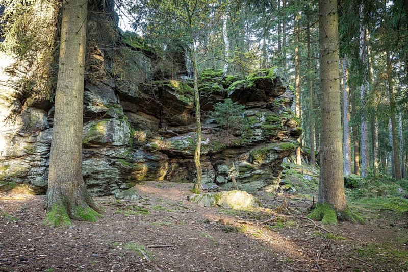 Schwarzer Stein rock formation with Versteinerter Mönch rock formation east of Grünbach in Vogtland, Saxony, Germany