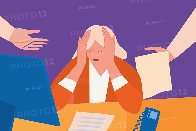 An overwhelmed and stressed worker at her desk, hands on head as her colleagues hand her documents and queries amidst a chaotic office atmosphere