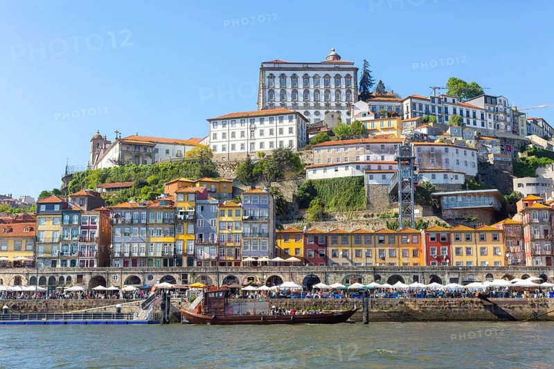 Historic riverside buildings on hillside of Ribeira next to River Douro, Porto, Portugal, Europe view to cathedral