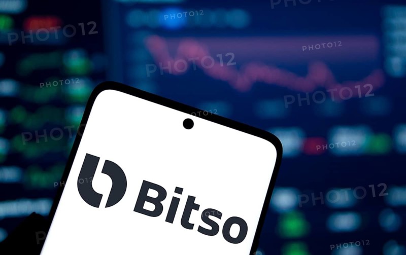 Bitso logo is displayed on smartphone. Bitso began as a global cryptocurrency exchange company