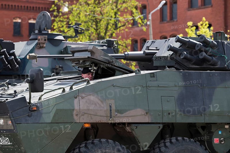 LEGNICA, POLAND, APRIL 26, 2023: Military picnic as part of the Cyber Mil Academy program. Soldier in armored personnel carrier KTO Rosomak