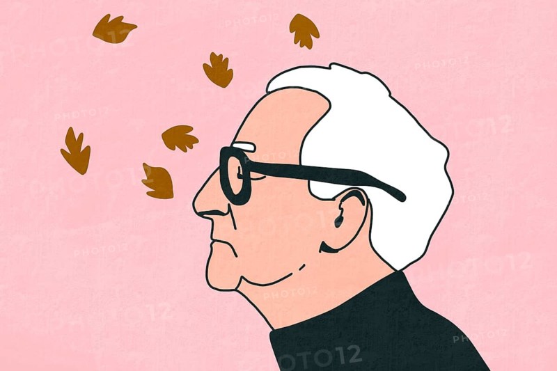 A minimalist illustration of an elderly profile in glasses with falling leaves on a pink background. The design captures simplicity and elegance through line art and soft colors