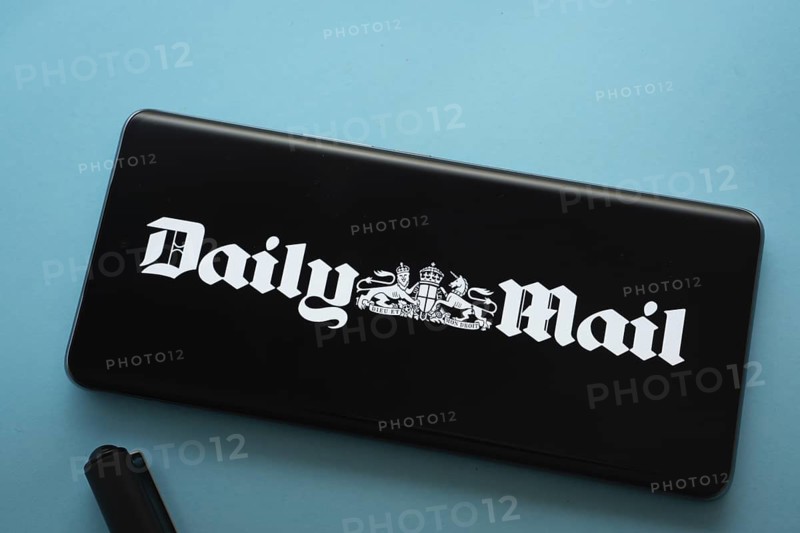 The logo of the Daily Mail is displayed on a smartphone screen