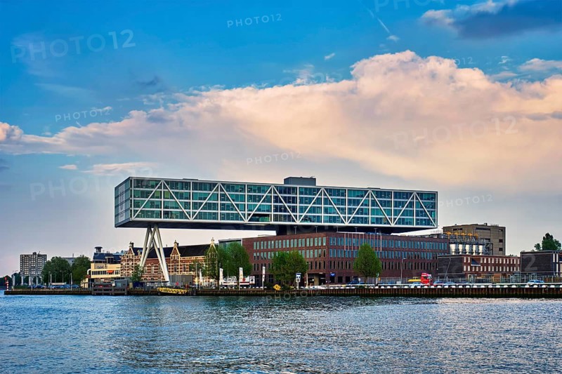 ROTTERDAM, NETHERLANDS, MAY 11, 2017: Unilever Bestfoods headquarters building De Brug (The Bridge) built over an existing historical factory from 1891 designed by architect Chris de Jonge
