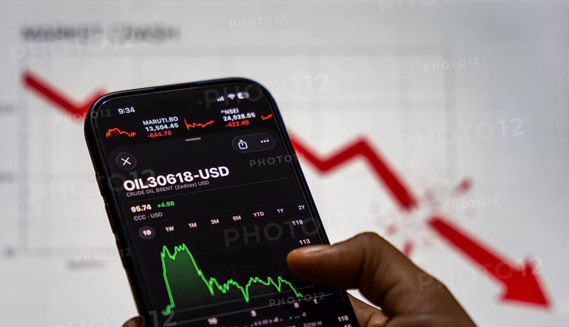 In this photo illustration, a smartphone displays the crude oil price in USD on March 09, 2026 in Guwahati, India. Global oil prices surged to their highest level since 2022 after escalating tensions in the US-Israel conflict with Iran raised concerns over potential disruptions to energy supplies, pushing Brent crude above Dollar 100 per barrel
