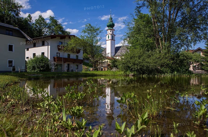 View of the village with parish church, Breitenbach am Inn, Inntal, Tyrol, Austria