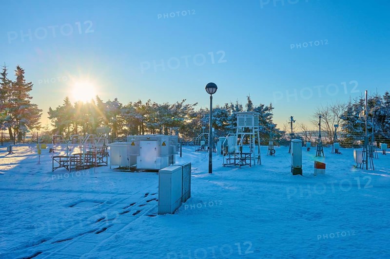 Weather station with snow-covered facilities at sunrise, winter, Wasserkuppe, Gersfeld, Rhön, Hesse, Germany