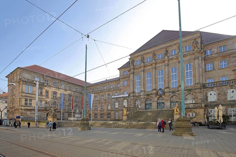 Town hall built in 1909 with EU flag, German national flag, Hessian state flag and city flag, flags, historicism, staircase, pedestrians, city coat of arms, Obere Königsstraße, Kassel, Hesse, Germany