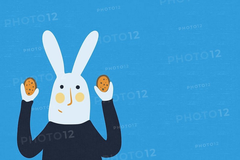 A playful illustration of a white Easter bunny holding chocolate eggs against a blue backdrop. The character features charming simplicity, perfect for festive themes