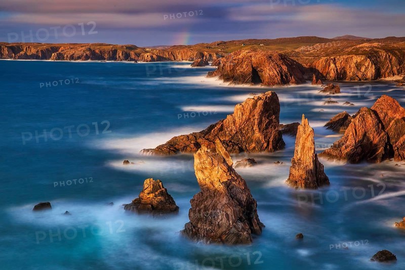 The towering Stac's of Mangersta rise dramatically from the Atlantic, sculpted by wind and waves into striking stone pillars. Located on the isle of Lewis in the Outer Hebrides, Scotland, they form a rugged, untamed coastline that is both majestic and otherworldly