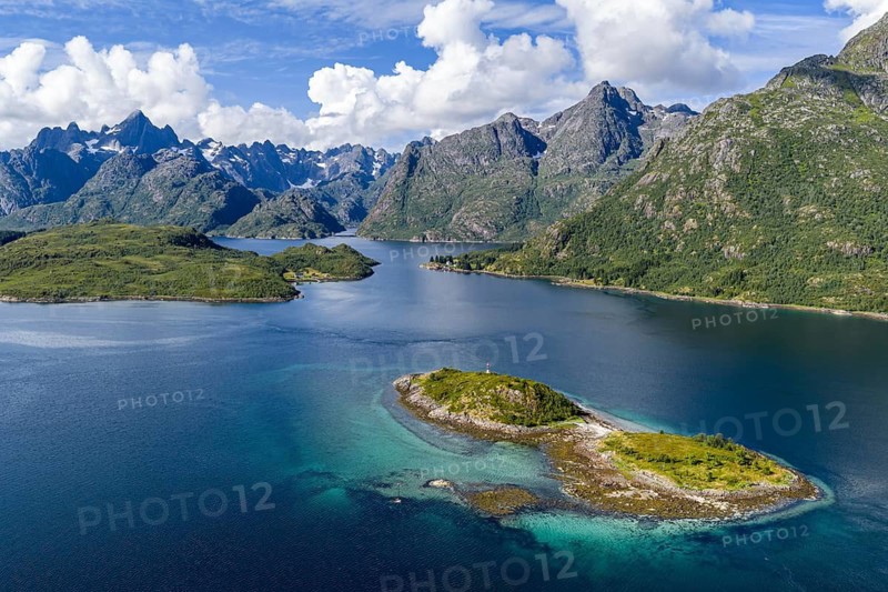 Aerial view over the Raftsund, the waterway between Lofoten and Vesteralen island, island Rognholman in front, entry to famous Trollfjord, Norway