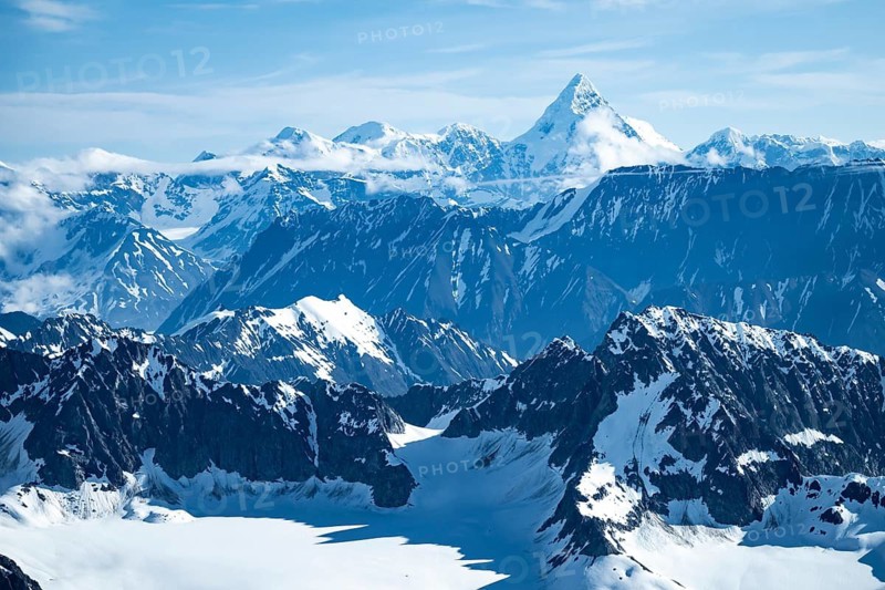Snow and ice, epic mountains with glaciers, aerial view, Alaska Range, Denali National Park, Alaska, USA