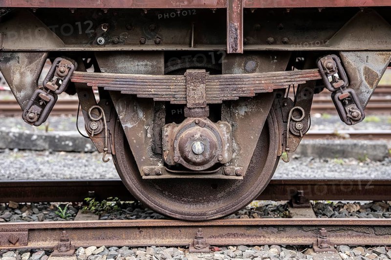Wheel and leaf suspension of a railroad car, Bochum railway museum, museum days weekend, with many attractions such as steam locomotive rides, 3 locomotives are under steam, historic trains make round trips through the Ruhr Valley, many locomotives are on display, on the site of the former Dahlhausen railway depot, North Rhine-Westphalia, Germany