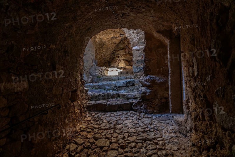 Narrow alley in the village of Sant'Antonino in Balagne, Corsica, France