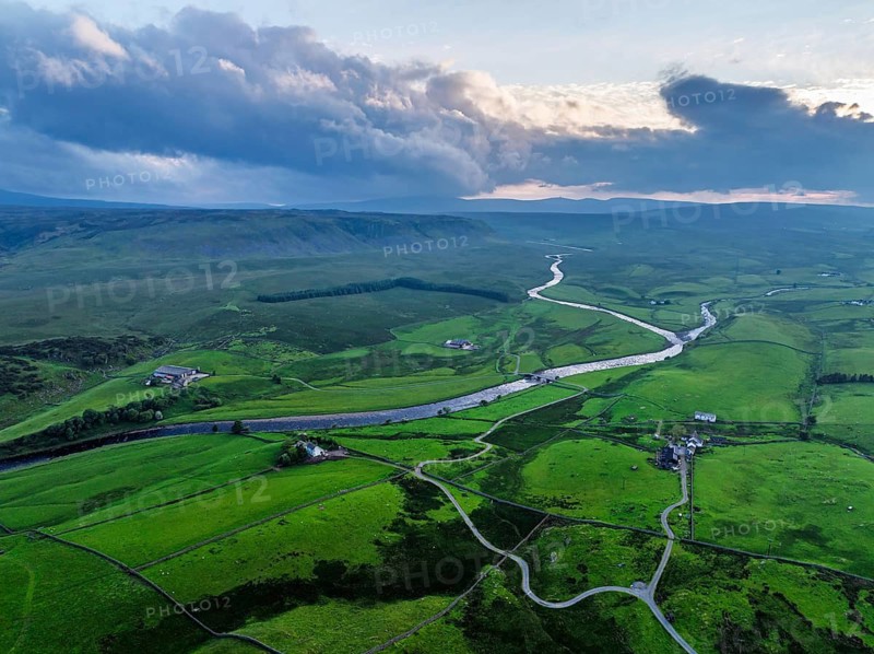 Forest in Teesdale over River Tees from a drone, North Pennines AONB, County Durham, England, United Kingdom
