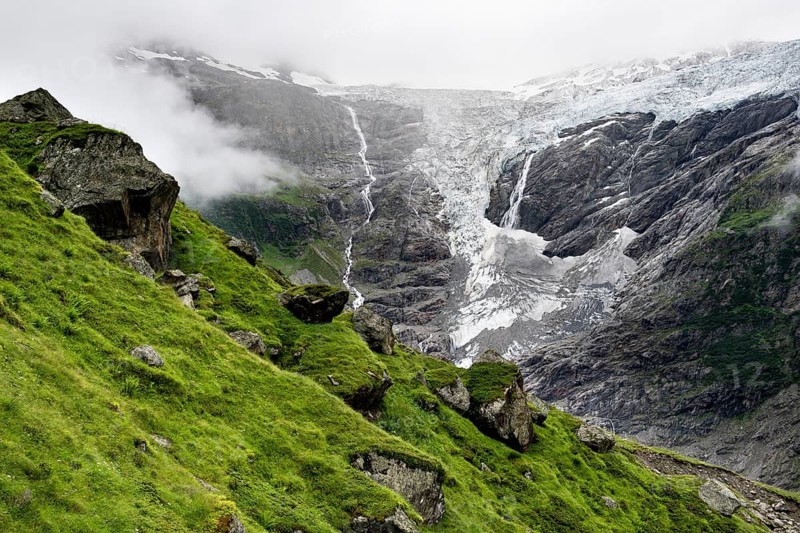 Cloudy mountain landscape with Grindelwald-Fiescherfirn glacier, Bernese Alps, Bernese Oberland, Switzerland