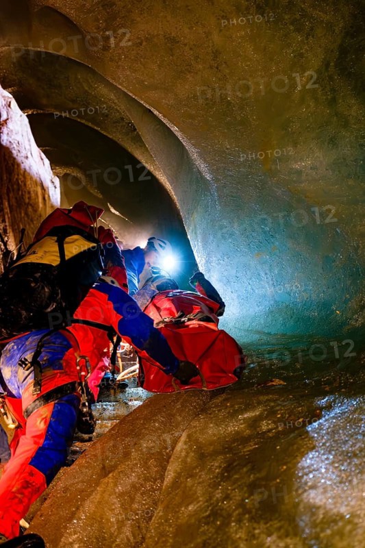 Cave rescuers from the Bavarian Mountain Rescue Service rescue an injured man from the Schellenberg ice cave, Marktschellenberg, Berchtesgadener Land, Upper Bavaria, Bavaria, Germany