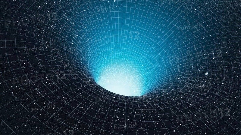 A man stands at the edge of a black hole, gazing into the vast abyss of the universe while stars twinkle around him in the cosmos