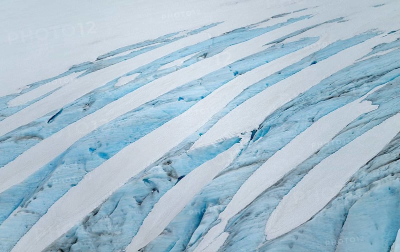 Blue rugged glacier ice with crevasses and snow, detail, Exit Glacier, Kenai Peninsula, Alaska, USA