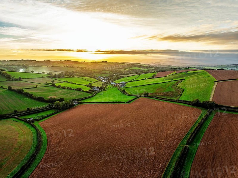 Colours of autumn Fields and Farms over Sheldon from a drone, Torbay, Devon, England, United Kingdom