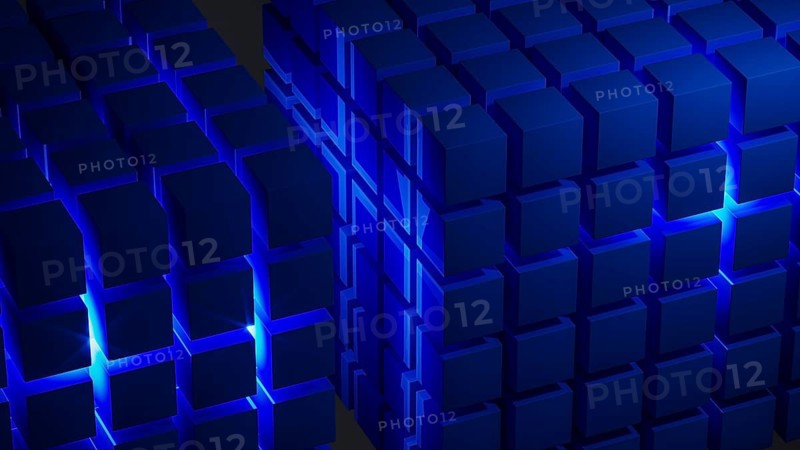 Cube structures create a captivating geometric arrangement highlighted by blue light, showcasing modern design concepts and technological inspiration