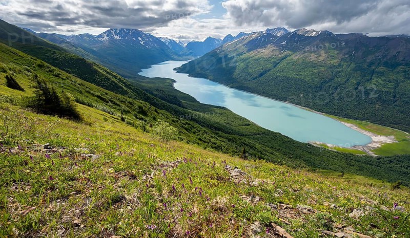 View of blue lake and mountains on Twin Peaks Trail, Eklutna Lake, Chugach Mountains, Chugach State Park, Alaska, USA