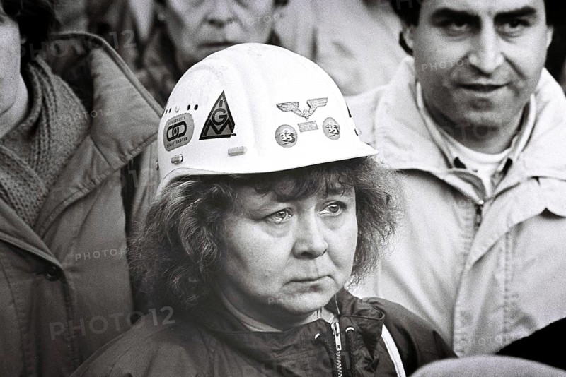 With tears in her eyes, an employee follows the works meeting for the closure of Krupp Rheinhausen, Duisburg, Germany
