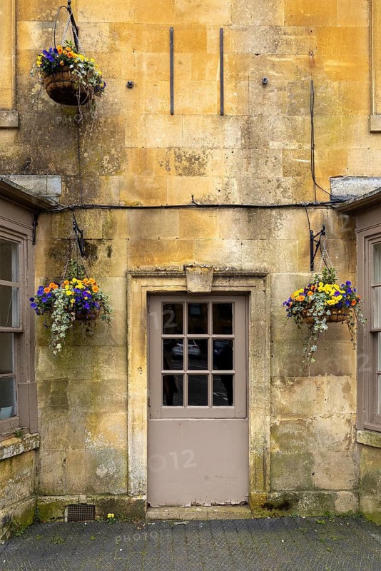 Front door, flower pot, Cotswold stone, wall, Moreton-in-Marsh, Cotswolds, England, Great Britain