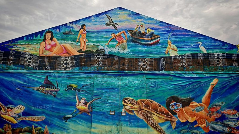 Maritime mural, mural, graffiti depicting people, marine animals and the ocean in vivid colors, hangar, warehouse at Mindelo Harbour, Sao Vicente Cabo Verde, Cape Verde, Cape Verde