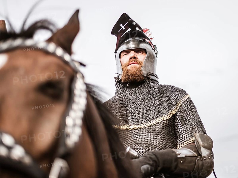 LUBIAZ, POLAND - AUGUST 25, 2018: Monastery Siege - historical staging. Portrait of knight on the horse