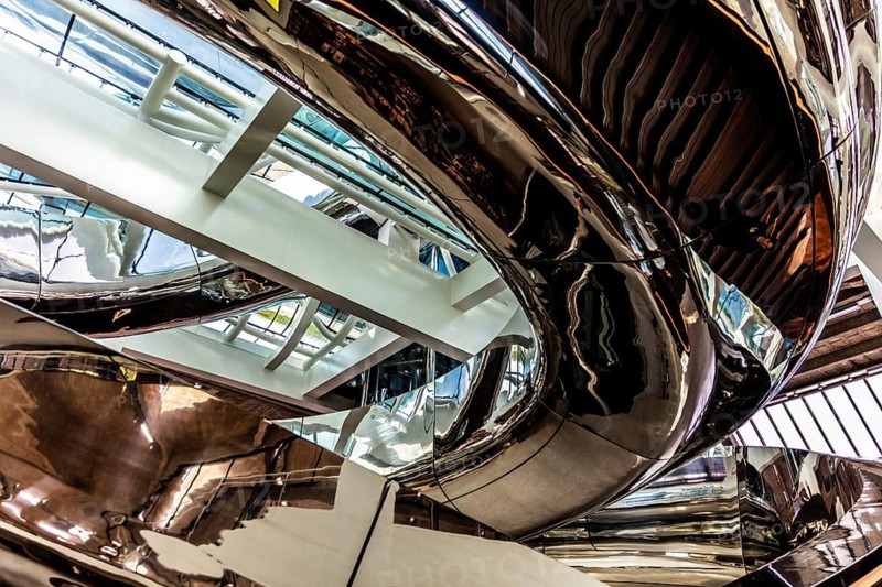 Spectacular double spiral staircase from ground floor to roof terrace, offering breathtaking views over the Maas and Hotel New York, FENIX, museum about migration, in a historic warehouse in Katendrecht, Rotterdam, the Netherlands