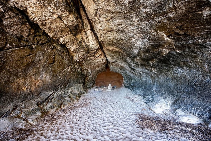 Rock cave on the beach at Cala Luna, Golfo di Orosei, Baunei, Sardinia, Italy