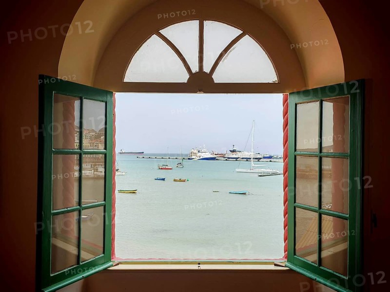 View of the sea through an open window with boats in a quiet atmosphere, Torre de Belem, Mindelo, Sao Vicente, Cabo Verde, Cape Verde, Cape Verde