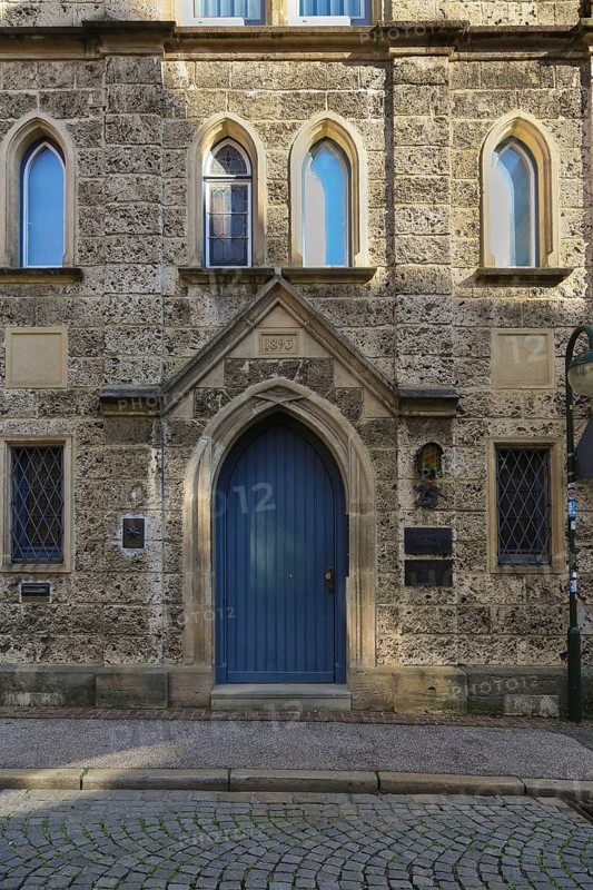 Entrance, blue wooden door, lodge sign, writing, letters, information board at the Marchtaler Hof, former Pfleghof of the Obermarchtal monastery. Seat of a Masonic lodge since 1886, Reutlingen, Baden-Württemberg, Germany