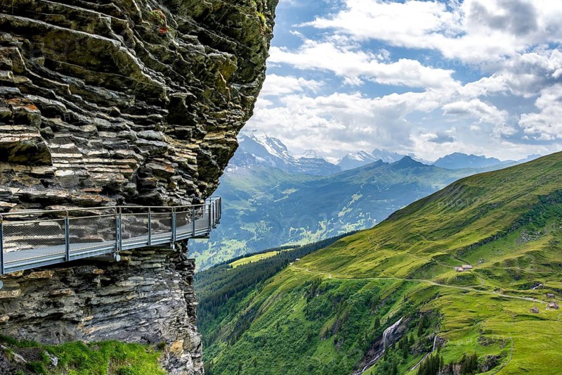 Tourist attraction First Cliff Walk, metal trail on a rocky outcrop, Grindelwald First, in front of impressive mountain scenery, Bernese Alps, Bernese Oberland, Switzerland