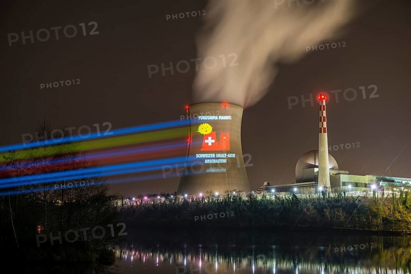 Protest action broadcast by the anti-nuclear organization, projection, night view, 05-03-2026, Waldshut, Leibstadt nuclear power plant, Rhine, Upper Rhine, Canton of Aargau, Switzerland
