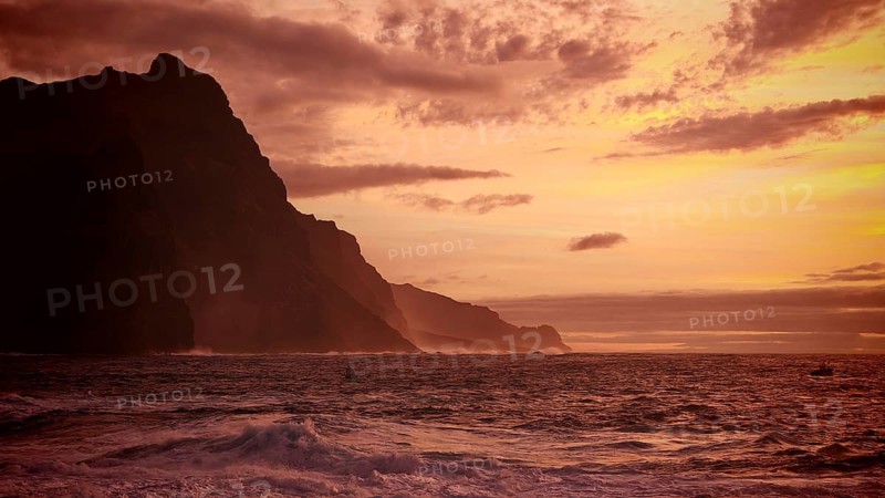 Dramatic silhouette of mountains during an intense sunset in shades of orange, Ponta do Sol, Santo Antao, Cabo Verde, Cape Verde, Cape Verde
