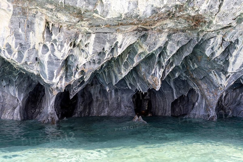 Marble caves (Cuevas de Mármol) with eroded rock formations over turquoise-coloured water, Lago General Carrera, Puerto Río Tranquilo, Región de Aysén, Chile